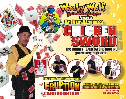 A man holding up cards in front of an advertisement.