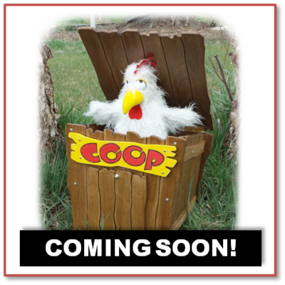 Chicken puppet in a wooden box.