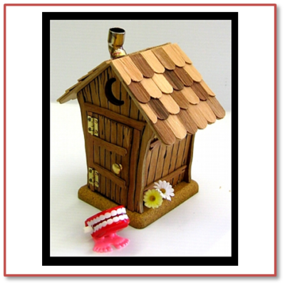 Miniature wooden house with details and decorations.